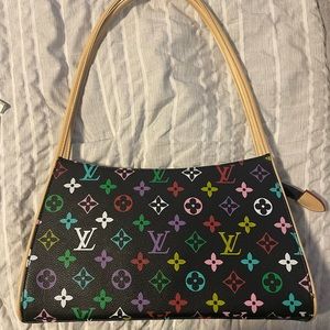Received this as a gift. Only wore it a few times. Mint condition LV bag.
